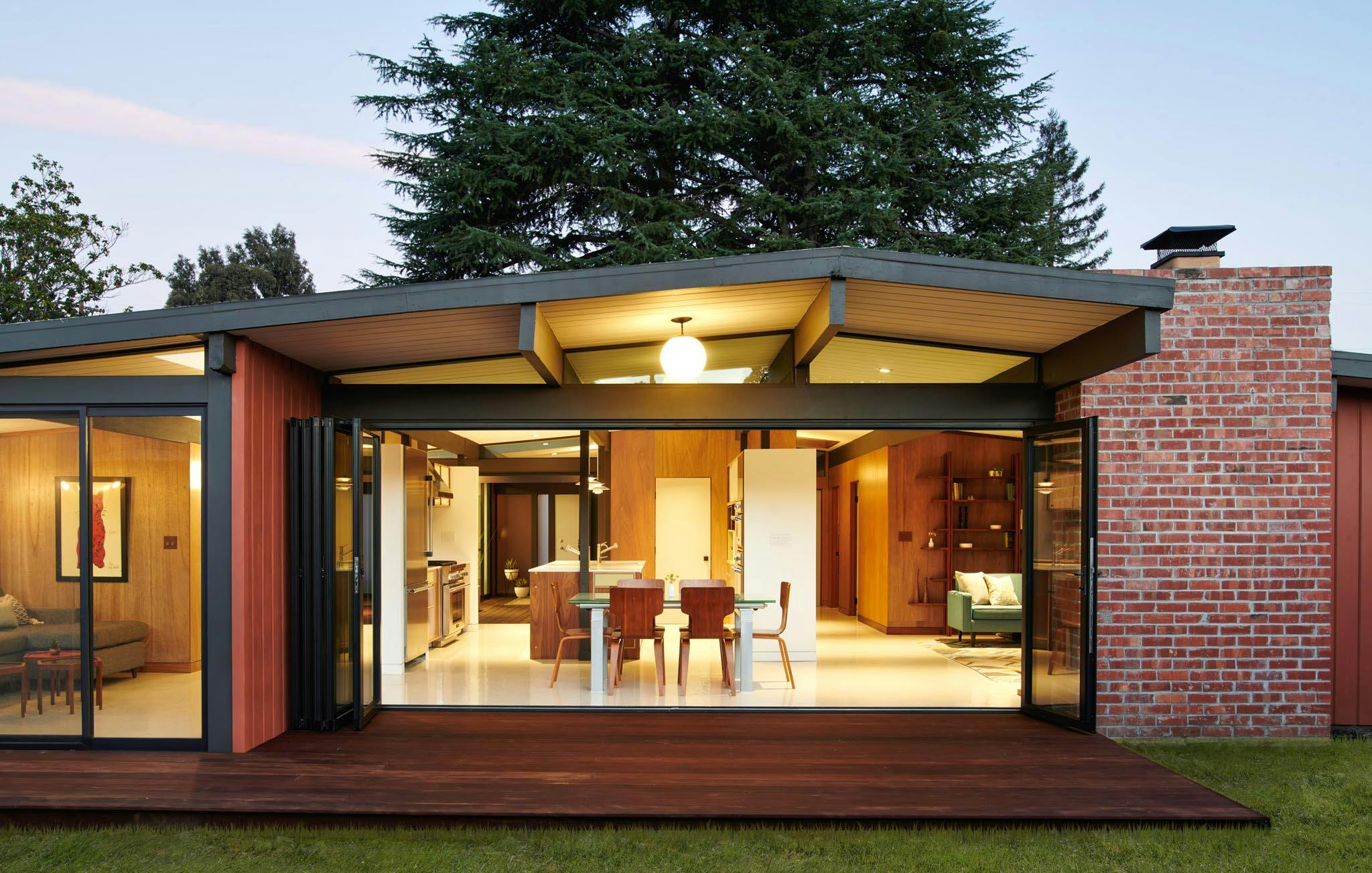 Eichler homes remodel with folding glass wall to let the outdoors in
