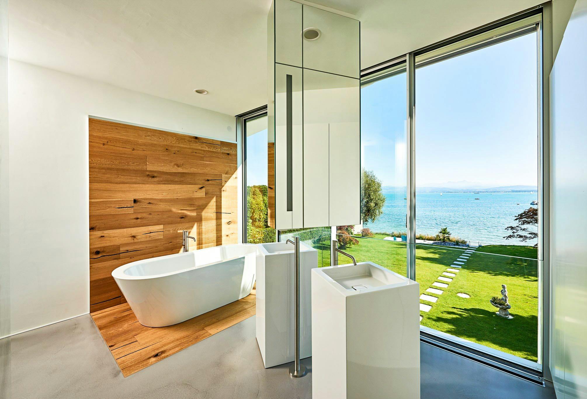 floor to ceiling minimal sliding glass walls in bathroom design inspiration