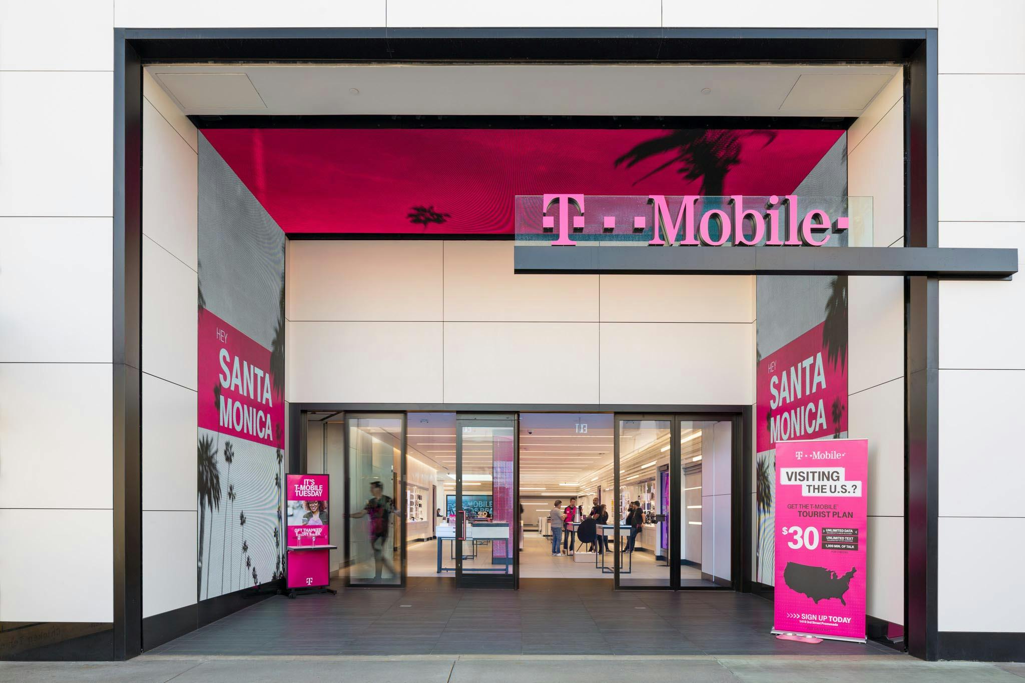 retail storefront commercial design for T-Mobile with opening glass walls