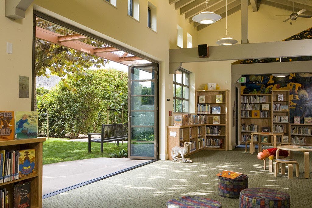 library in Palo Alto with folding glass walls with horizontal mullions to allow for expanded learning space in school design