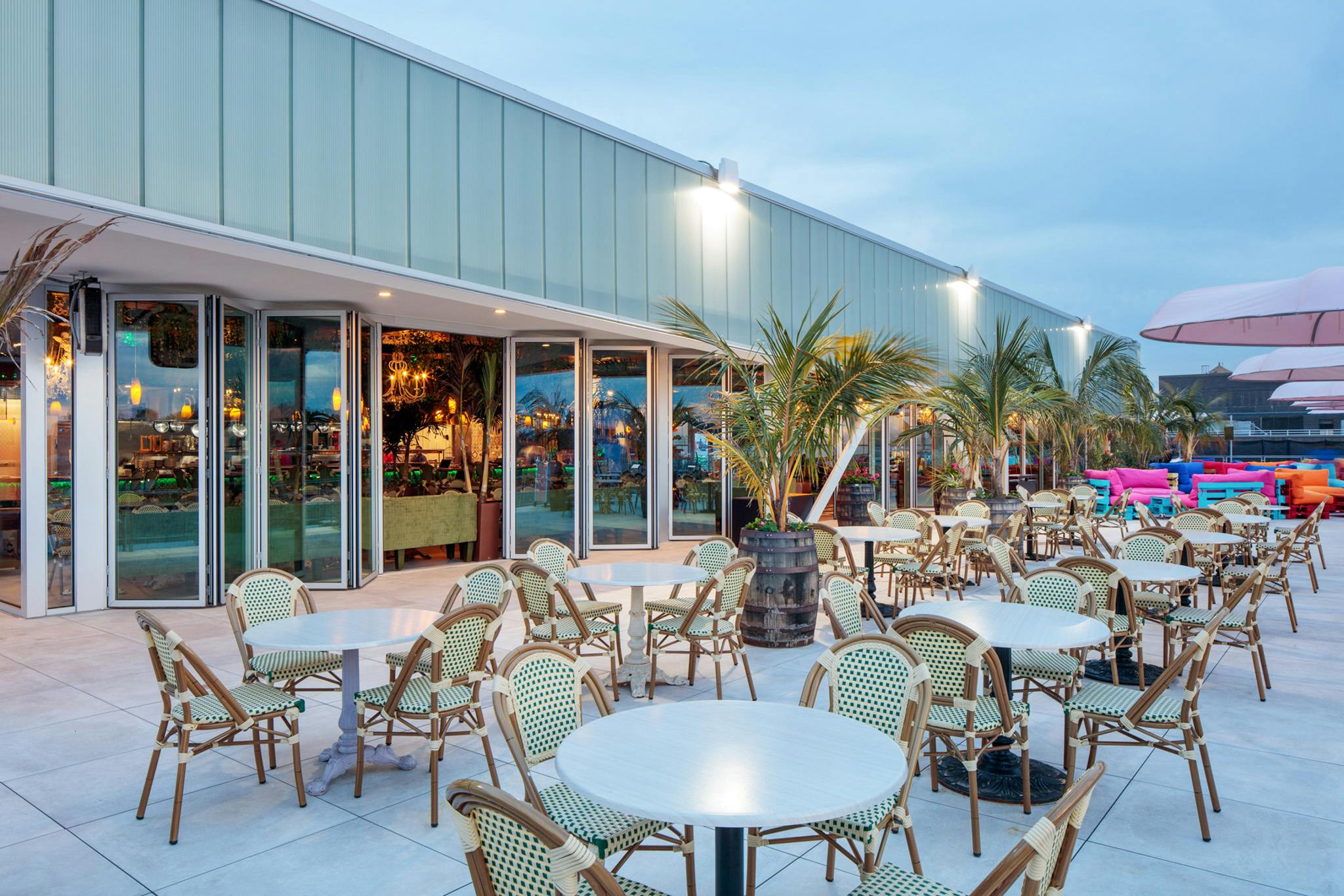 commercial folding glass doors in rooftop restaurant