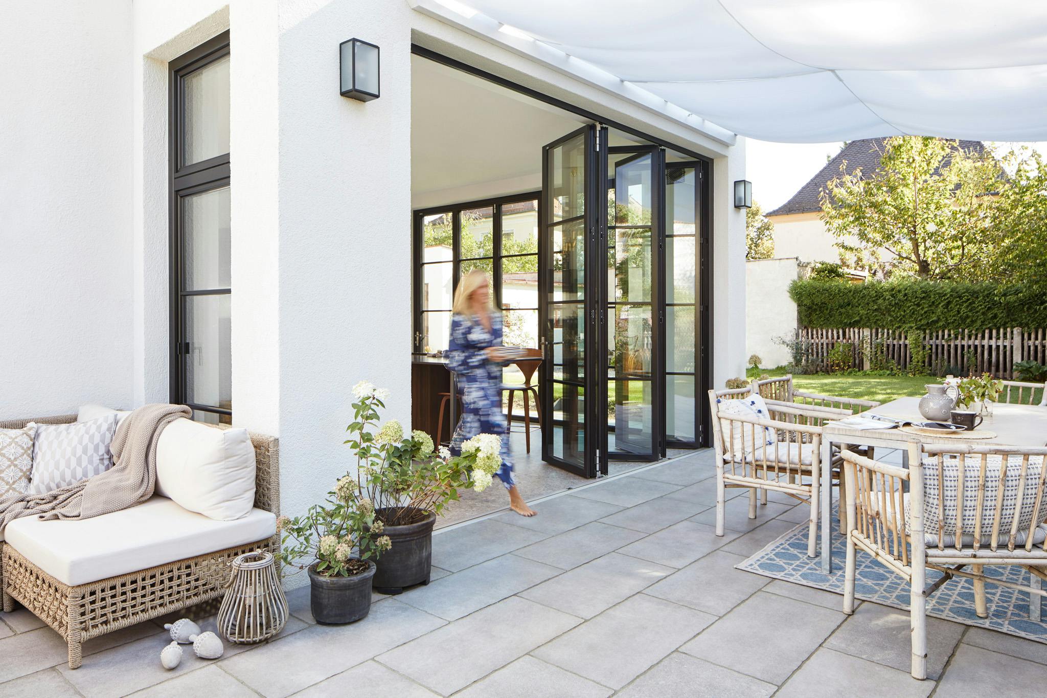 opening glass patio doors for outdoor dining