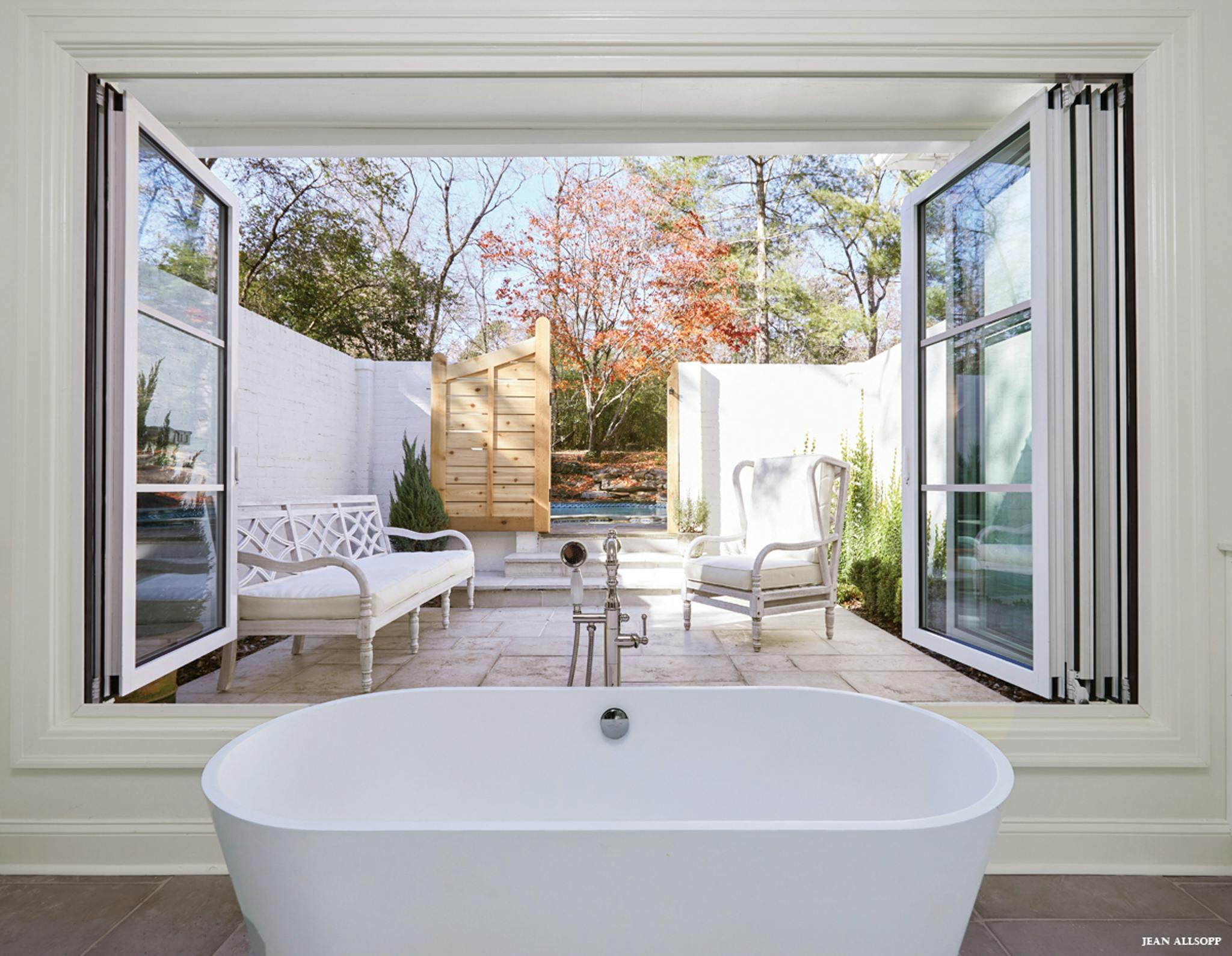 indoor outdoor bathtub with retractable glass doors
