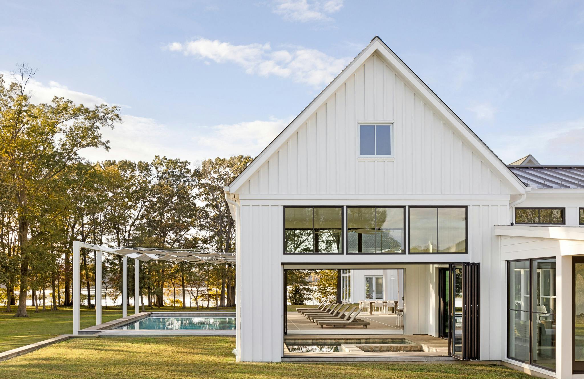 Modern farmhouse with NanaWall folding glass doors