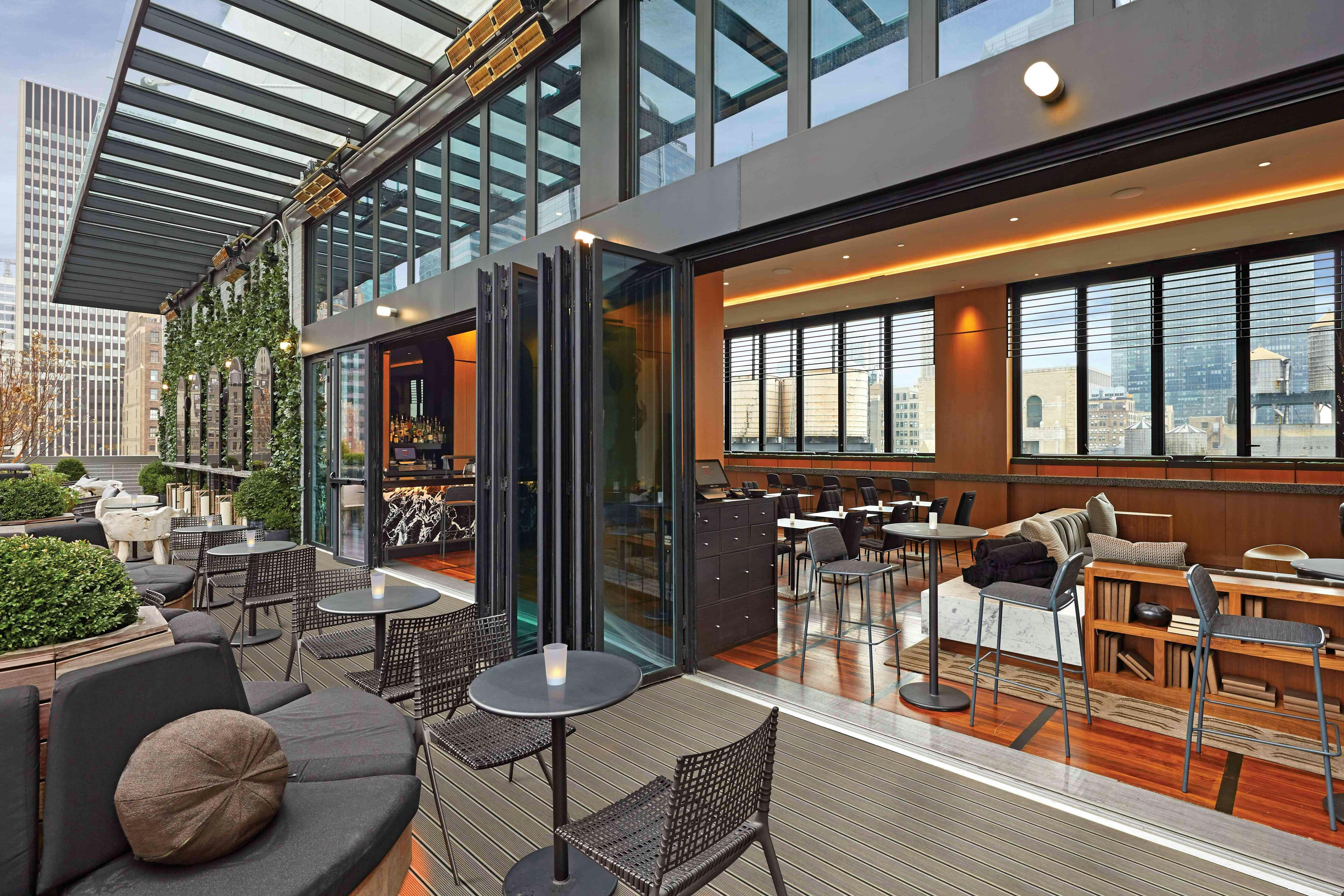 rooftop-bar-with-opening-glass-wall