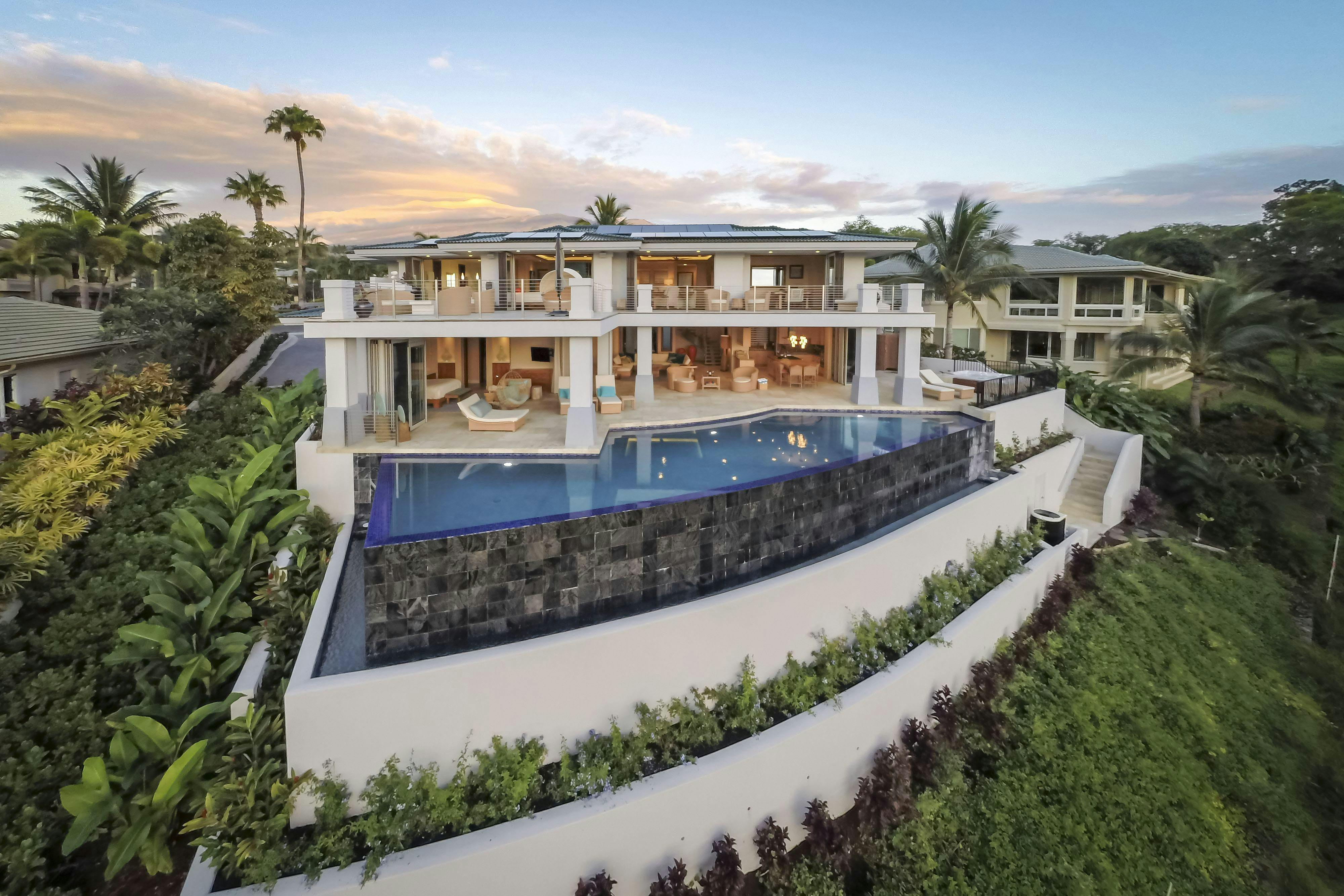 house in hawaii with no floor track sliding glass wall