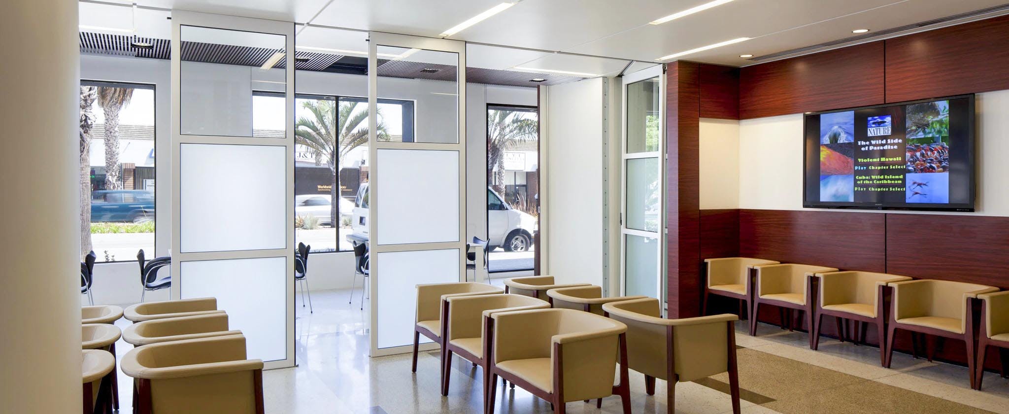 lobby waiting room in health care facility with Operable Interior Glass Systems